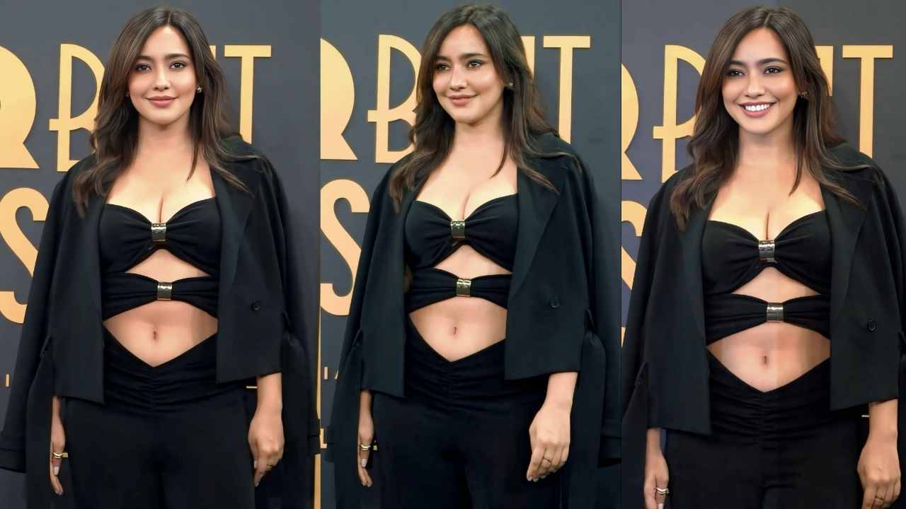 Neha sharma hot cleavage & navel exposed in cut out outfit