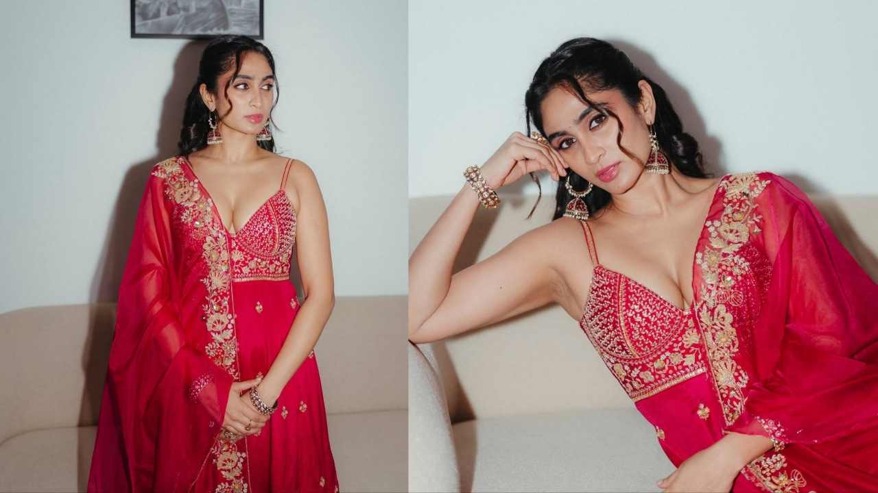 Deepti sati hot cleavage exposed in red sleeveless salwar